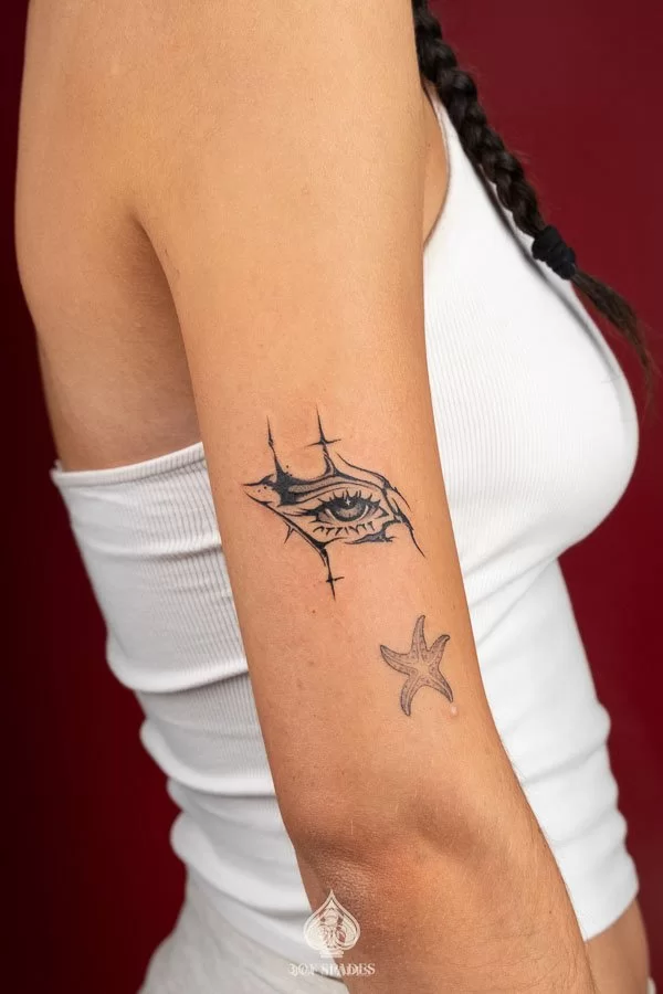 Blackwork Eyes Tattoo